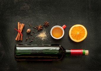 Mulled wine recipe ingredients on chalkboard - warming drink