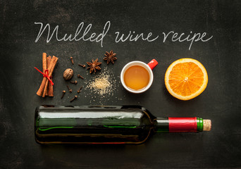 Mulled wine recipe ingredients on chalkboard - winter drink