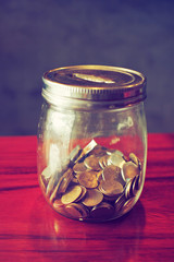 coin in money jar