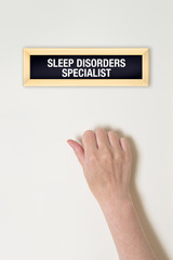 Female hand is knocking on Sleep Disorder specialist door