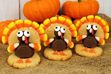 Homemade Thanksgiving turkey shaped cookies on burlap