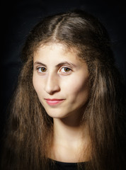 Fototapeta premium Cute young armenian girl posing in studio