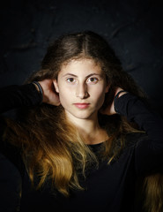 Fototapeta na wymiar Cute young armenian girl posing in studio