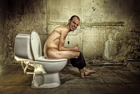Ugly Man in Toilet