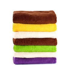 Stack of clean fresh towels isolated on white background