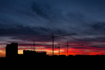 sky at sunset with cityscape panorama