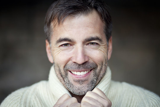 Mature Man Smiling in a forest