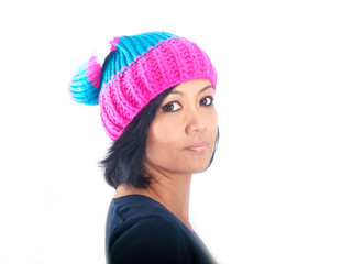 middle-aged asian woman wearing a colorful winter cap	