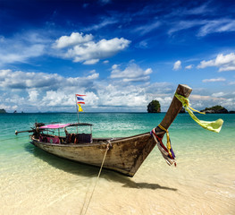 Long tail boat on beach, Thailand