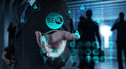 Double exposure of businessman hand showing search engine optimi