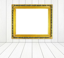 blank golden frame in room with white wood wall and wood floor