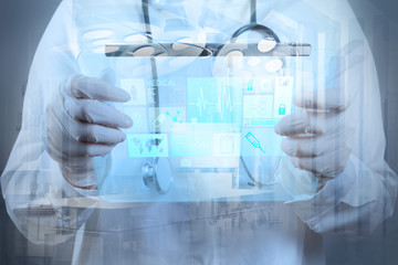  Medicine doctor hand working with modern computer interface as