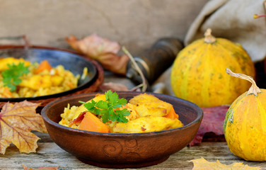 rice curry with fried fish and pumpkin