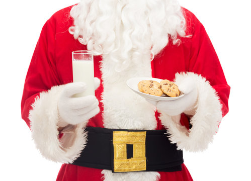 Close Up Of Santa Claus With Milk And Cookies