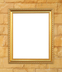 blank golden frame on brick stone wall