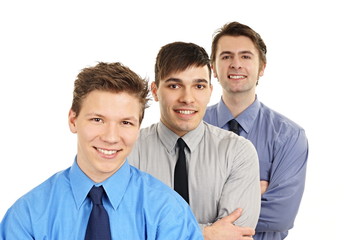 Three business young people shows you thumbs up