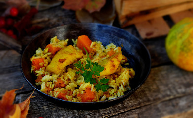 rice curry with fried fish and pumpkin