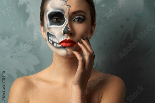 beautiful woman with makeup skeleton