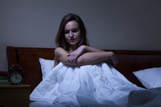 Woman staying awake at night