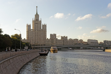 Moscow city center highrise tower on the sunrise and yacht saiMo