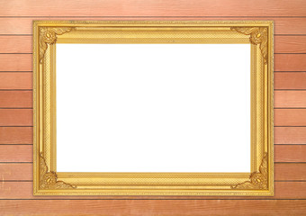 blank golden frame on wood wall