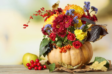 Fototapeta premium Beautiful autumn composition on table on bright background