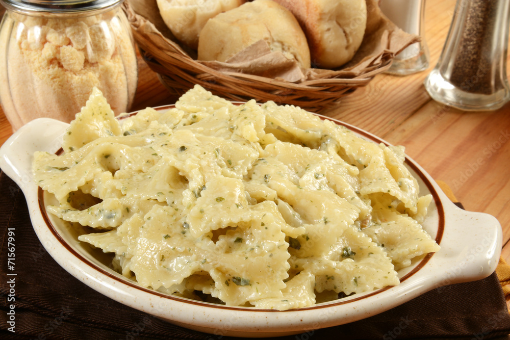 Poster Farfalle pasta with creamy basil pesto