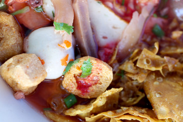 Thai Noodles spicy soup in macro shot.