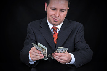 Businessman counting money