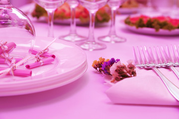 Buffet table with dishware waiting for guests