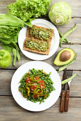 Healthy salad with peas and asparagus served