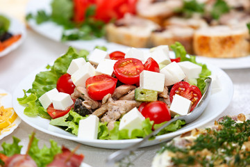 Light salad with cheese, parsley and spices