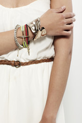 Close up of young woman in white dress, studio