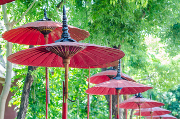 Red umbrella in thai temple