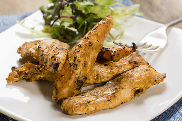 Grilled chicken strips with side salad