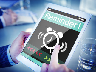 Man Using Digital Tablet with Reminder