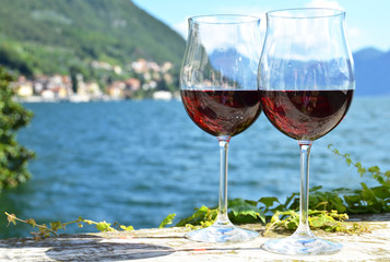 Two wineglasses. Varenna town at the lake Como, Italy