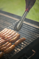 delicious german sausages on the barbecue grill