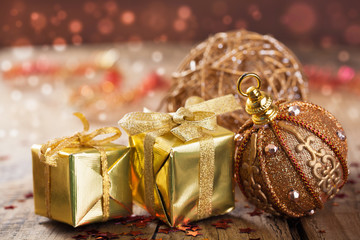 Fototapeta na wymiar golden christmas gifts and decoration