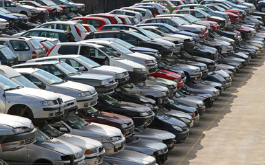 several cars destroyed in the landfill of car demolition