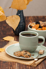 Fototapeta premium Autumn Concept. Cup Of Tea Or Coffee. Dried Fruits. Cookies With