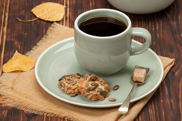 Autumn Concept. Cup Of Tea Or Coffee. Cookies With Seeds. Wooden