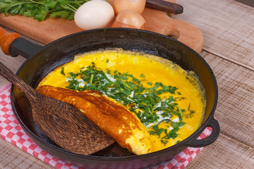 Omelette in frying pan