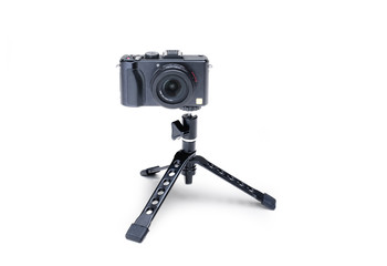 Folding tripod with compact camera
