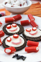 Smiling and funny cookies with sweets