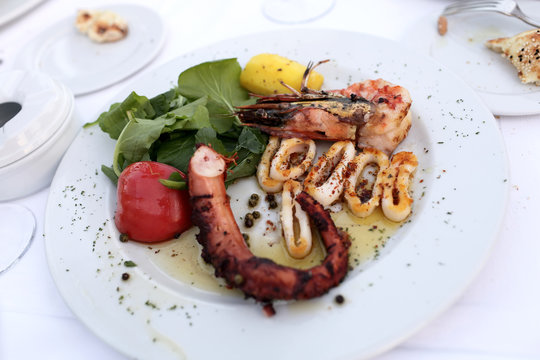 Plate with grilled seafood