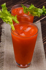 Bloody mary cocktails  on wooden background