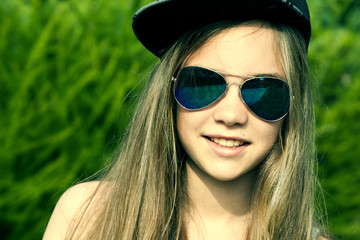 portrait of young casual girl with hat