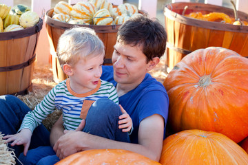 Fototapeta premium family at pumpkin patch