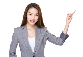 Businesswoman with finger point up